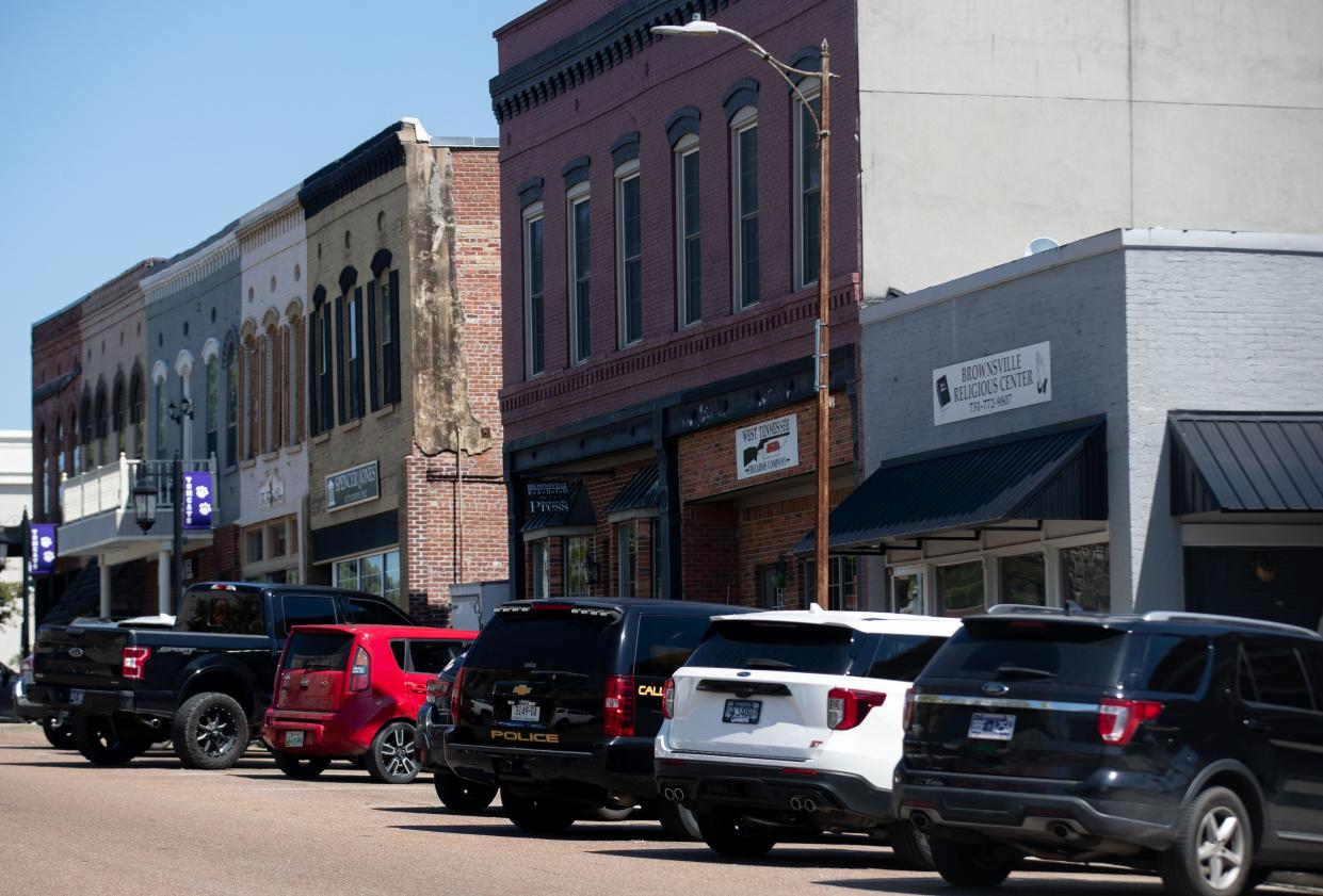 Brownsville’s Courthouse Square is lined with parked cars on Sept. 13, 2022, about a year after Ford's BlueOval City project was announced. Brownsville is about 13 miles from the $5.6 billion electric truck and battery project in Stanton.