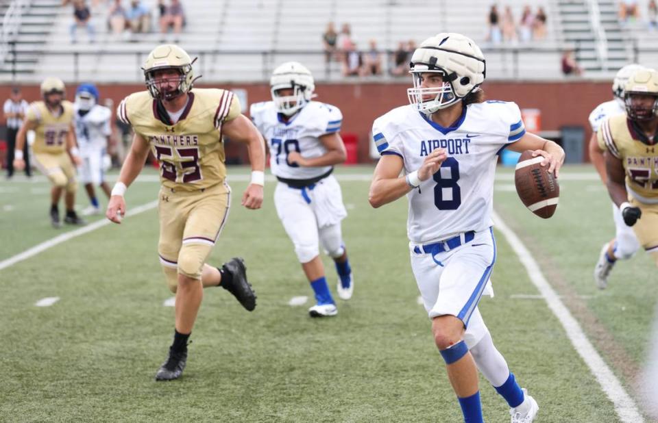 Airport quarterback Jesse Hoover (8) carries the ball Friday during the Lexington 1 Sports-A-Rama Jamboree. Sam Wolfe/Special To The State