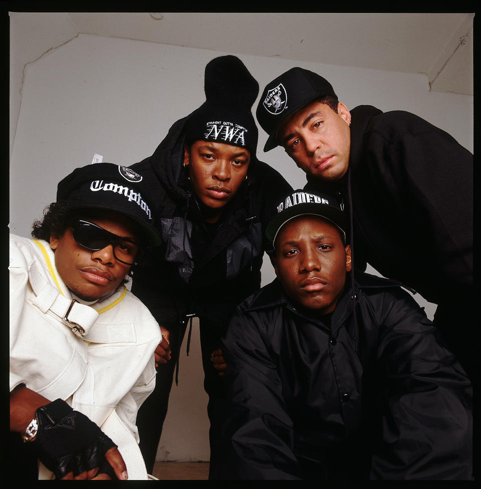 (Original Caption) : 1990-The rap group N.W.A are shown in a studio pose. From left to right: Eazy-E (in straightjacket and sunglasses), Dr. Dre, MC Ren (bottom) and DJ Yella. (Photo by Lynn Goldsmith/Corbis/VCG via Getty Images)