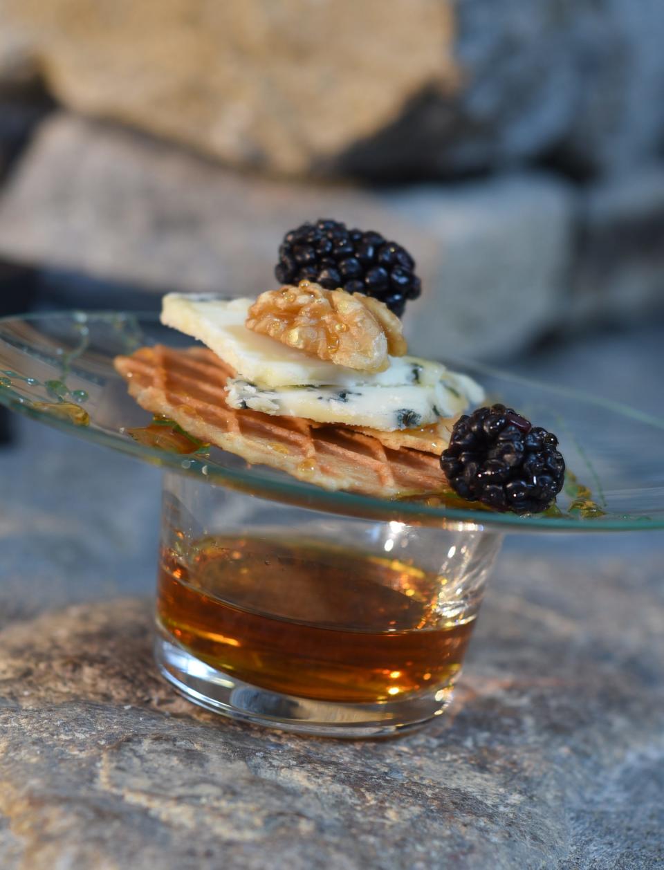 Cheese, fruit and a sweet wafer or cookie on an individual plate -placed on top of a cocktail is a creative way to serve your guests.