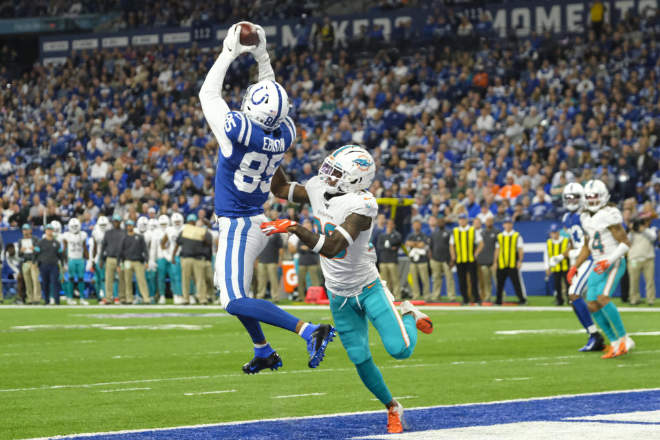 Indianapolis Colts tight end Eric Ebron (85) makes a catch in the end zone over Miami Dolphins defensive back Steven Parker (26) during the first half of an NFL football game in Indianapolis, Sunday, Nov. 10, 2019. The play was rule an interception by Parker. (AP Photo/AJ Mast)