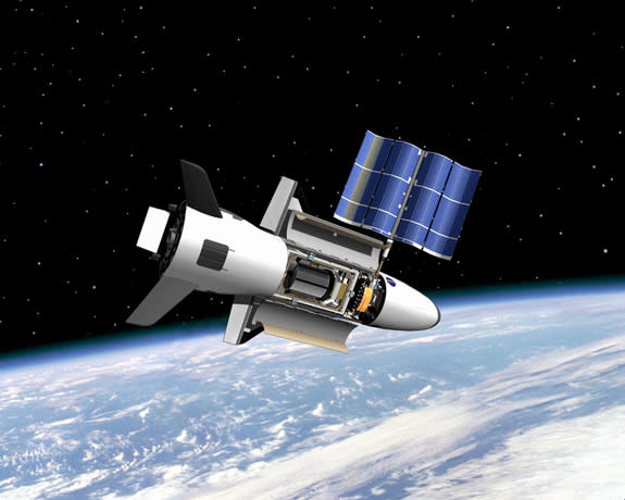 An artist's illustration of the U.S. Air Force's X-37B space plane in orbit. The solar-powered winged spacecraft has spent more than 620 days in orbit as part of the military's secret OTV-3 mission, which launched in December 2012.