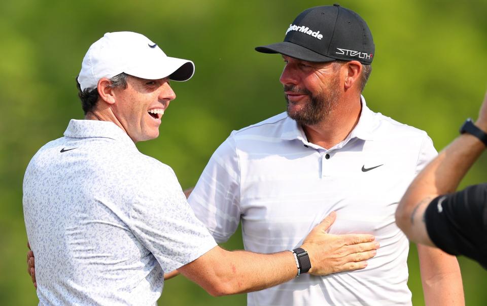 Celebrations and disbelief all round as Rory McIlroy celebrates with Block after his memorable ace - Getty Images/Andrew Reddington