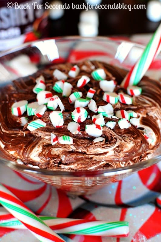 <p>Back For Seconds</p><p>This Peppermint Hot Chocolate Dip is easy, no bake, festive deliciousness that uses just 3 ingredients and takes less than 5 minutes to make! </p><p><strong>Get the recipe: <a href="https://backforseconds.com/peppermint-hot-chocolate-dip/" rel="nofollow noopener" target="_blank" data-ylk="slk:Peppermint Hot Chocolate Dip;elm:context_link;itc:0;sec:content-canvas" class="link rapid-noclick-resp">Peppermint Hot Chocolate Dip</a></strong></p>