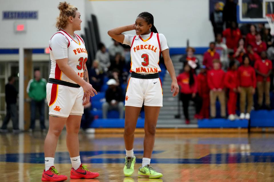 Purcell Marian's Jayda Mosley (30) made six three-pointers in the Cavaliers' regional final win over Badin. Ky'Aira Miller finished with 10 points and five assists.