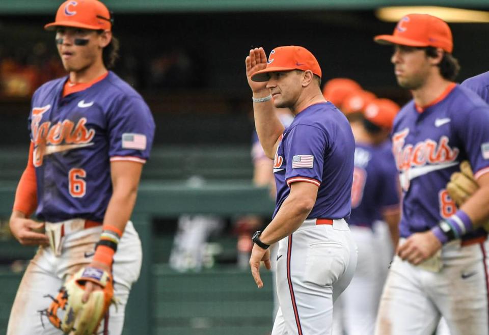 Clemson Head Coach Erik Bakich (middle) during the top of the eighth inning of game 2 with Georgia Tech at Doug Kingsmore Stadium in Clemson Friday, May 3, 2024.