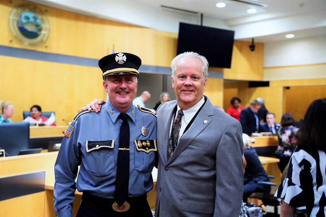 Firefighter John Segalbacher, left, and Legislator Paul Cleary, D-Haverstraw, in Rockland Legislature chambers on Aug. 6, 2024. The Legislature approved line-of-duty death benefits for volunteer firefighters, EMS, and auxiliary police.