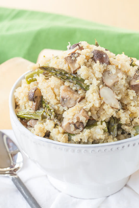 <p>Cupcakes & Kale Chips</p><p>Add everyone's favorite spring veggie to this healthy and satisfying side. Get this <a href="https://cupcakesandkalechips.com/roasted-asparagus-mushroom-quinoa-pilaf/" rel="nofollow noopener" target="_blank" data-ylk="slk:Roasted Asparagus and Mushroom Quinoa Pilaf;elm:context_link;itc:0;sec:content-canvas" class="link rapid-noclick-resp">Roasted Asparagus and Mushroom Quinoa Pilaf</a> recipe!</p>