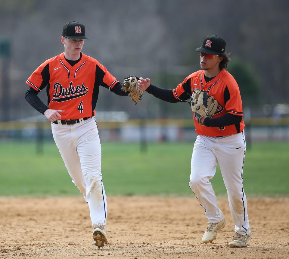 Marlboro baseball teammates John Ryder, left, and Chris Thorne, photographed during an April 27, 2022 game, helped the Iron Dukes beat Burke Catholic in a Section 9 Class B semifinal on Wednesday.