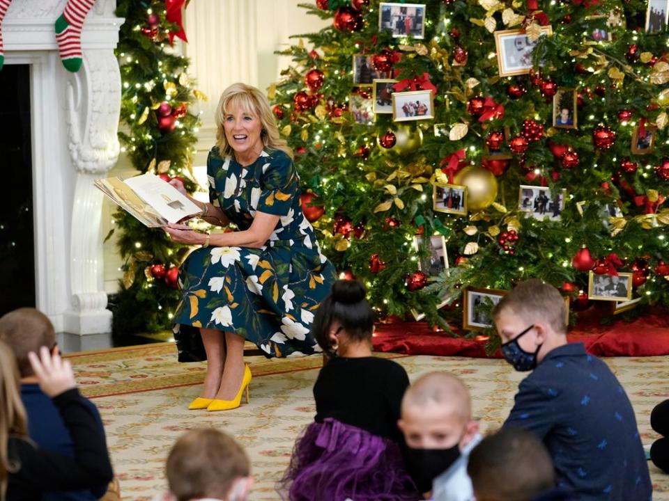 First lady Jill Biden reads a book co-written with granddaughter Natalie, “Don’t Forget, God Bless Our Troops,” to a group of students from Malcolm Elementary School (AP)