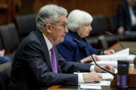 Federal Reserve Chairman Jerome Powell and Treasury Secretary Janet Yellen, listen to lawmakers during a House Committee on Financial Services hearing on Capitol Hill in Washington, Wednesday, Dec. 1, 2021. (AP Photo/Amanda Andrade-Rhoades)