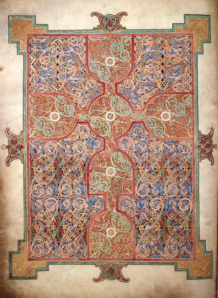 A highly decorative page from an illuminated manuscript.