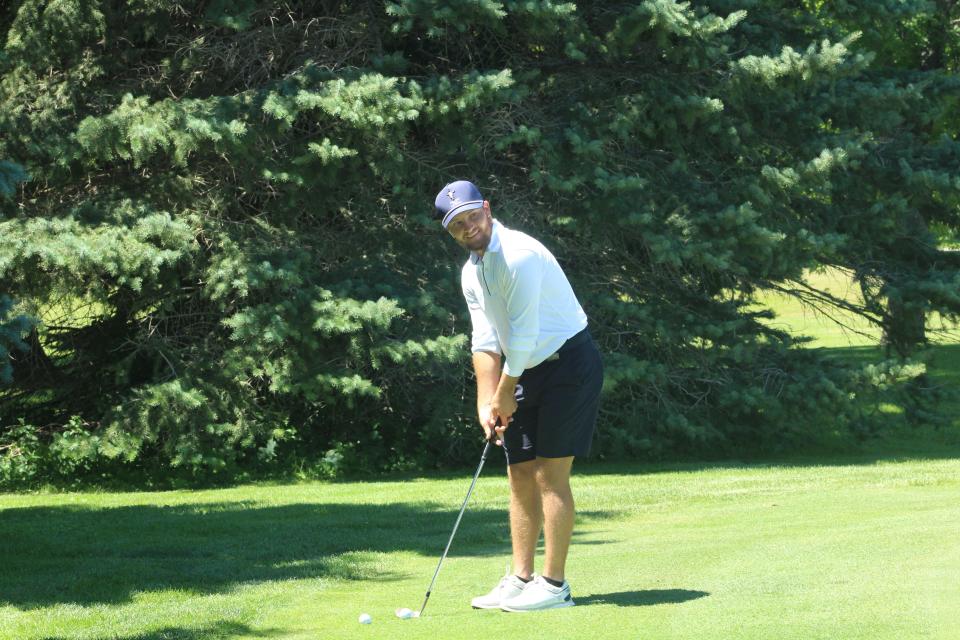 Zander Winston practices at the Moccasin Creek Country Club in Aberdeen on Thursday afternoon.