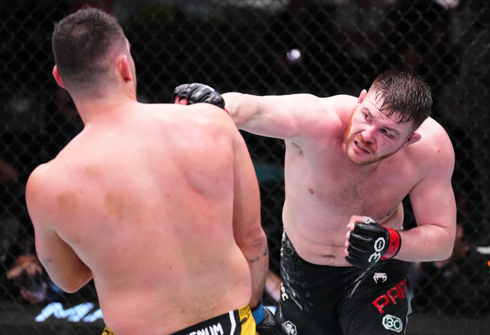 LAS VEGAS, NEVADA – NOVEMBER 18: (R-L) Mick Parkin of England punches Caio Machado of Brazil in a heavyweight fight during the UFC Fight Night event at UFC APEX on November 18, 2023 in Las Vegas, Nevada. (Photo by Chris Unger/Zuffa LLC via Getty Images)