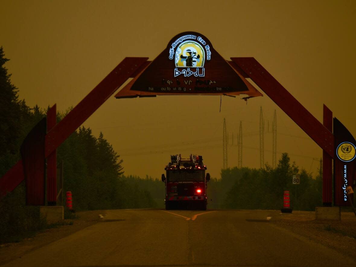 A fire truck at the Oujé-Bougoumou access road. Fires have forced the evacuation of the Cree community in northern Quebec. Several other Cree communities are also dealing with impacts of wildfires raging in the region. (submitted by Jeff MacNeill - image credit)