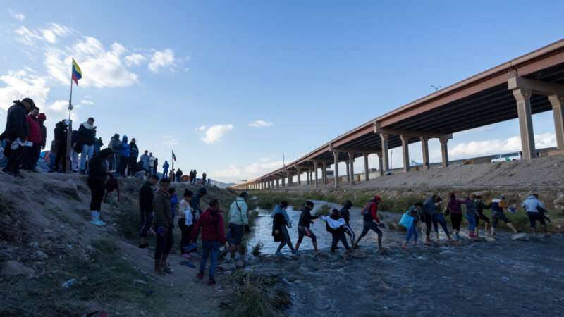 Venezuelan migrants cross the Rio Grande border between Mexico and the U.S.