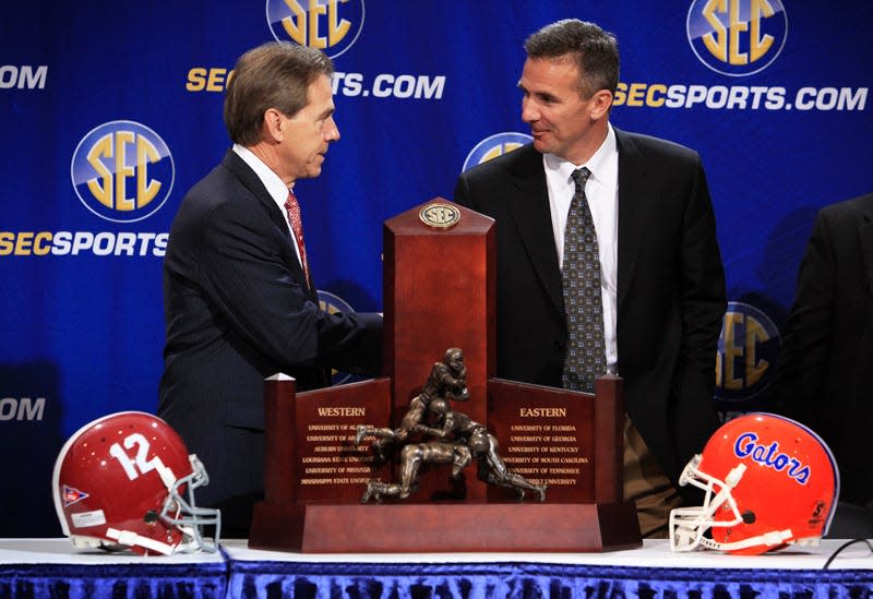 Pictured during a media session at the 2009 SEC Championship Game. Saban's success at Alabama in the SEC has been something to applaud but it was Meyer's Florida Gators in the mid-to-late-2000s that launched the conference's run of dominance.