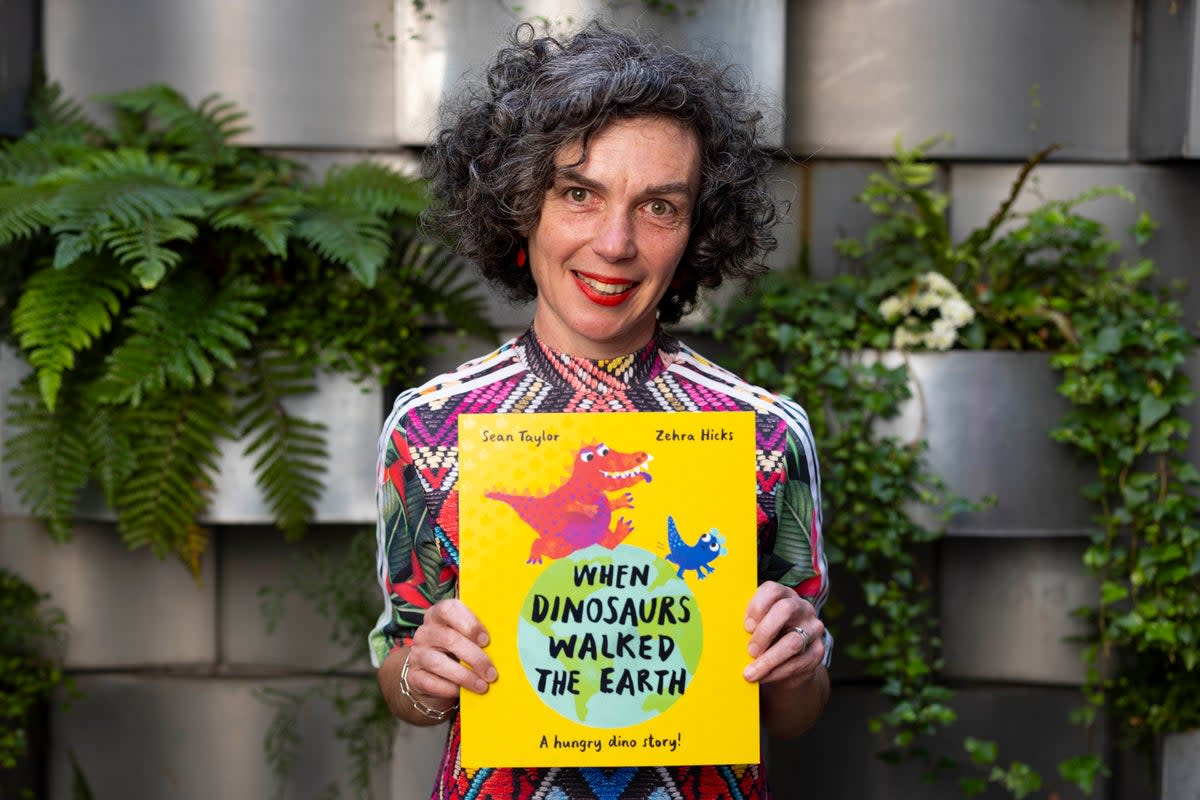Zehra Hicks, the illustrator for winning book  When Dinosaurs Walked the Earth at the ceremony (David Parry/PA Media Assignments)