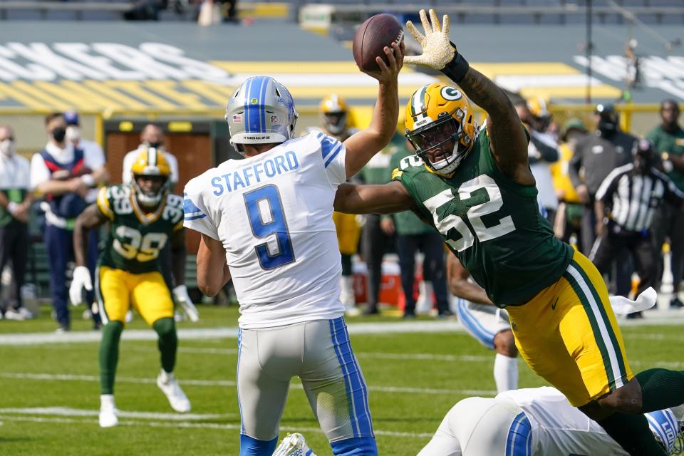 Detroit Lions' Matthew Stafford throws an interception to Green Bay Packers' Chandon Sullivan (39) during the second half of an NFL football game Sunday, Sept. 20, 2020, in Green Bay, Wis. (AP Photo/Morry Gash)