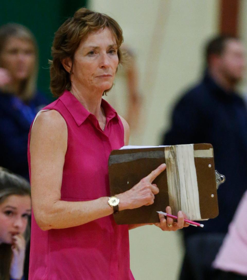 Ursuline coach Susan Heiss sends in a signal in the fourth game of a DIAA tournament semifinal at St. Mark's Thursday.