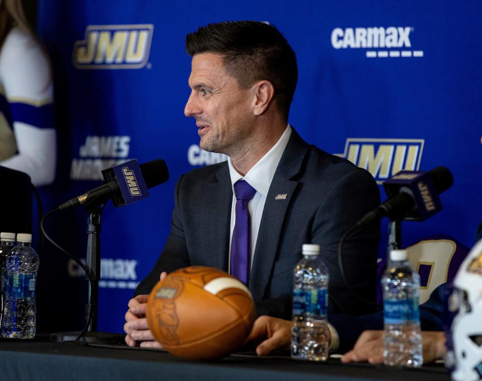 Purple is a familar color to Bob Chesney, now the football coach at James Madison.