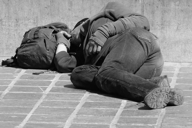 homeless black man laughing