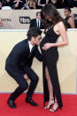 <p>At the Screen Actors Guild Awards, Stamos fawned all over his bride-to-be’s pregnant belly, and McHugh loved it. Do you think they even realized that photographers were snapping away? (Photo: Frazer Harrison/Getty Images) </p>