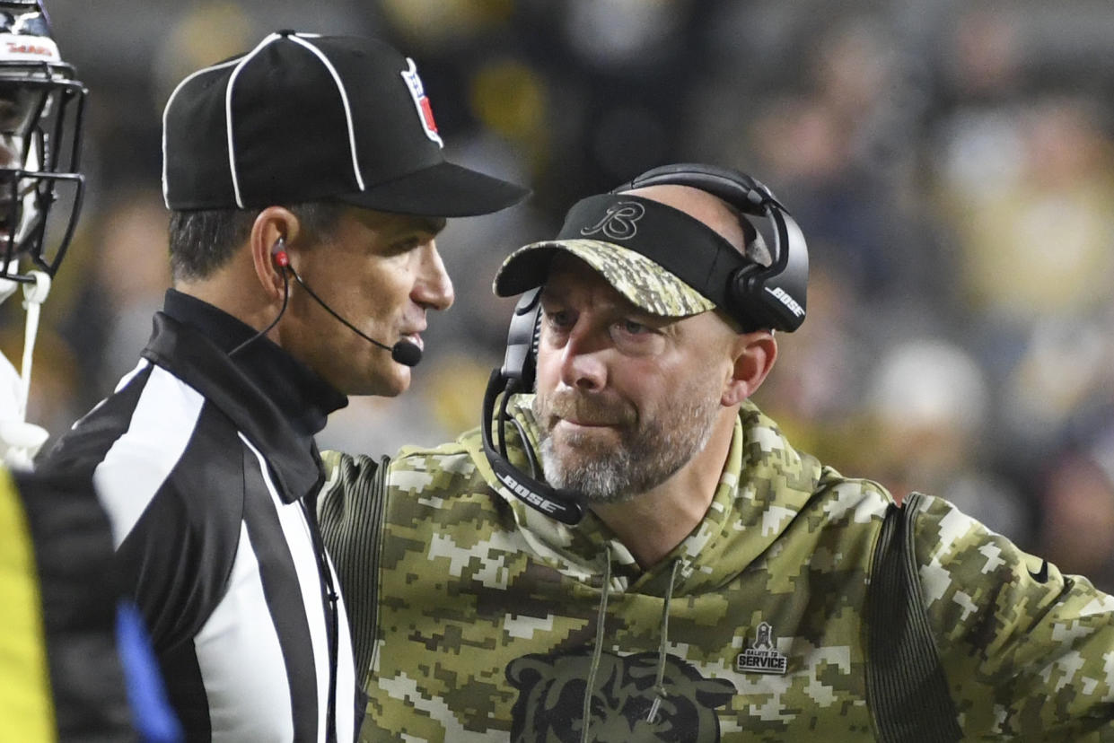 Chicago Bears head coach Matt Nagy, right, talks to an official as his team plays against the Pittsburgh Steelers on the sideline during the second half of an NFL football game, Monday, Nov. 8, 2021, in Pittsburgh. (AP Photo/Fred Vuich)