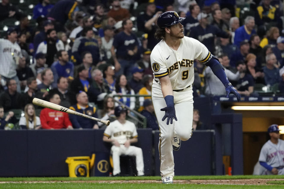 Milwaukee Brewers' Brian Anderson tosses his bat after hitting a two-run home run during the fourth inning of a baseball game against the New York Mets Monday, April 3, 2023, in Milwaukee. (AP Photo/Aaron Gash)