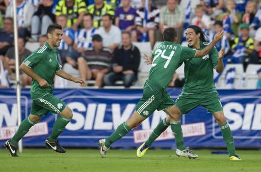 File photo shows Panathinaikos players during a Champions League qualifying match in July 2011. Qualifying for next May's Champions League final at London's Wembley Stadium is already underway, and some major names enter the fray this midweek