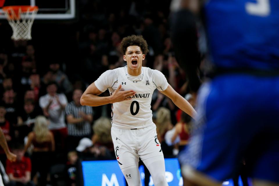 Cincinnati Bearcats guard Daniel Skillings (0) reacts after scoring a basket during the first half of the basketball game between the Cincinnati Bearcats and the Chaminade Silverswords on Monday, Nov. 7, 2022, at Fifth Third Arena in Cincinnati. The Cincinnati Bearcats defeated the Chaminade Silverswords 98-55.