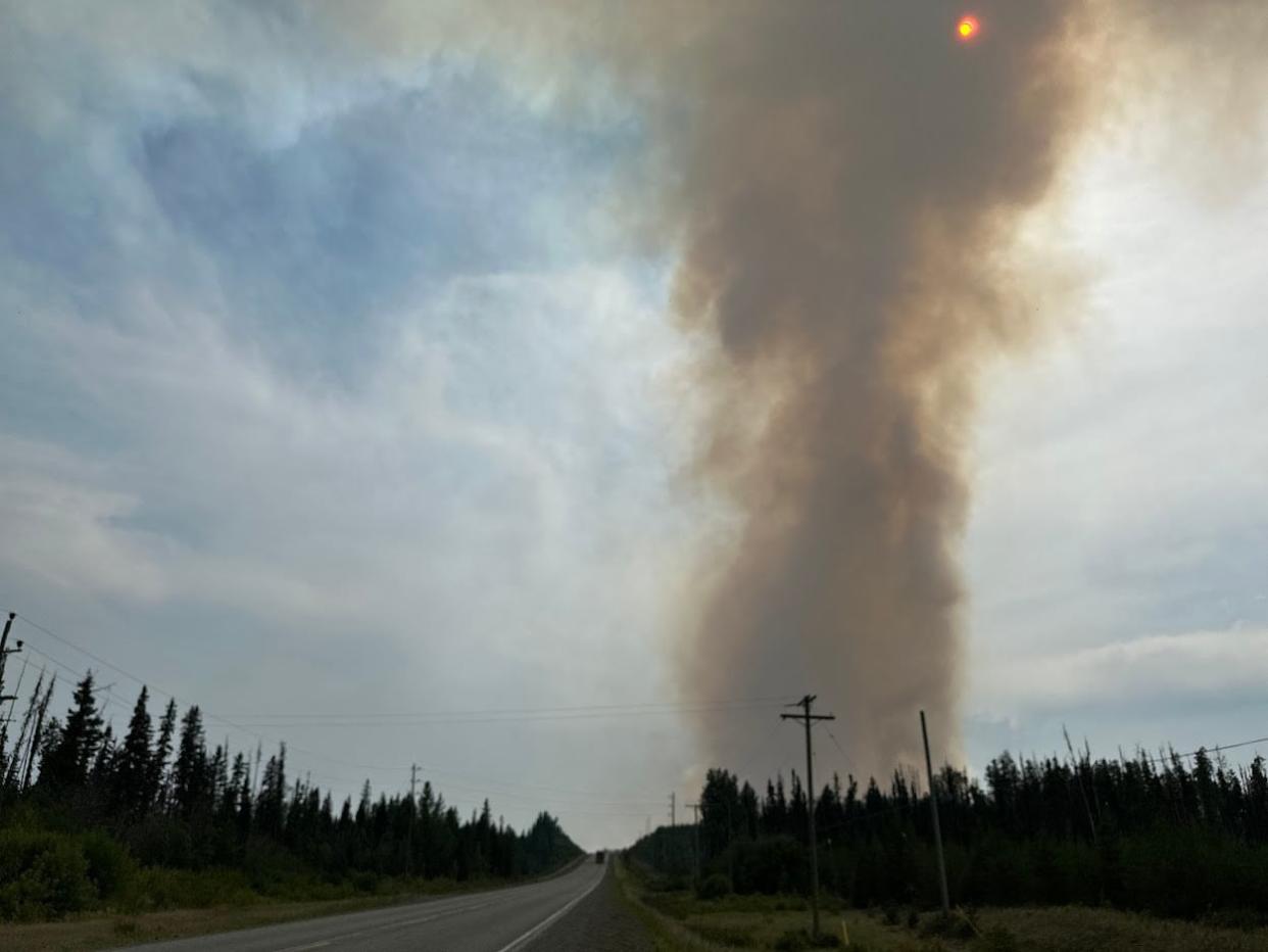 Smoke from Tsah Creek fire south of Fort St. James is pictured in July 2023. The B.C. Wildfire Service says smoke is once again visible from some fires that went dormant at the end of the 2023 fire season and are now re-emerging.  (Catherine Hansen/CBC - image credit)