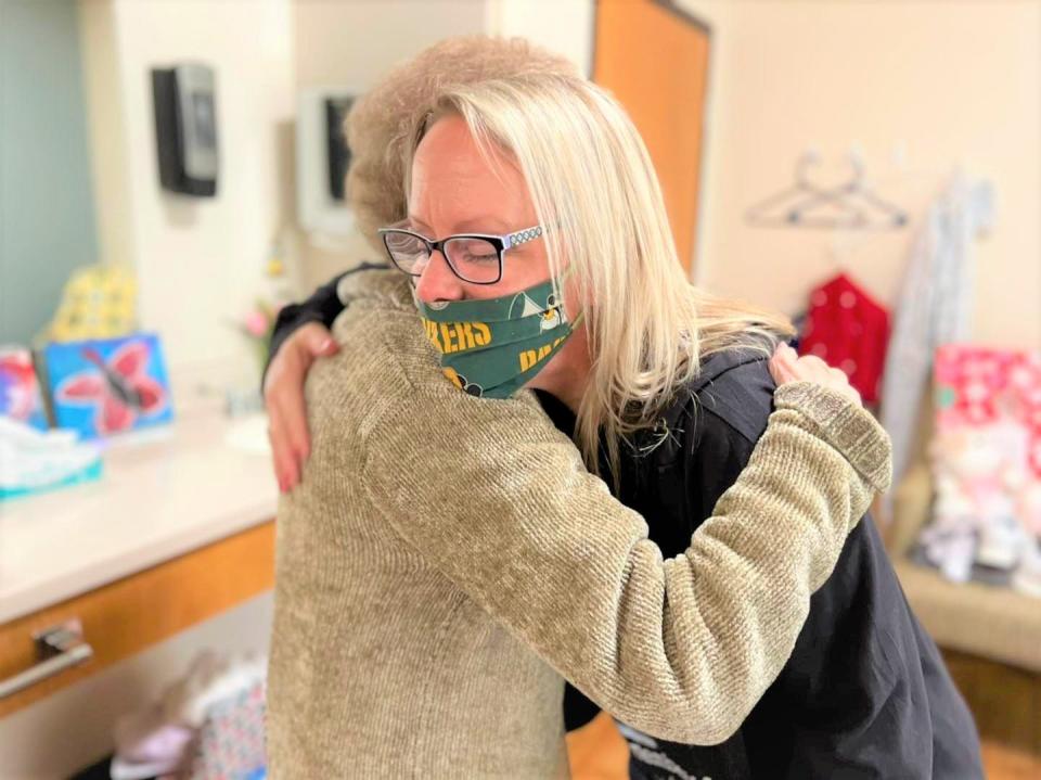 #DifferenceMaker Lisa Baker delivers a basket to memory care resident, Sandy, who was overjoyed to know she was thought about and loved during the 2022 Project Deliver the LOVE event.