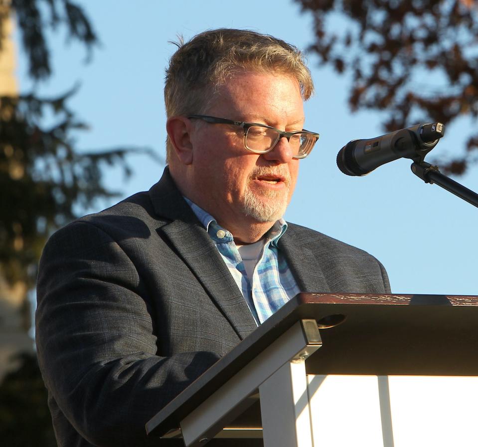 Tim Thompson, Pastor at Sherwood Oaks Christian Church, speaks during the 100th Anniversary of the placement of the  Miss Indiana Statue atop the Lawrence County Soldiers, Sailors, and Pioneers Monument Monday, Nov. 27, 2023.