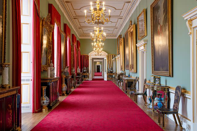 <p>Royal Collection Enterprises Limited 2024 | Royal Collection Trust</p> The East Wing’s Principal Corridor at Buckingham Palace