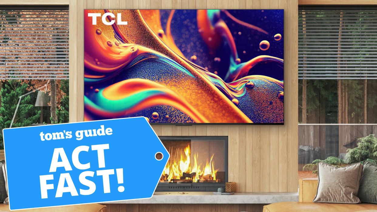  The TCL QM8 TV in a living room. 
