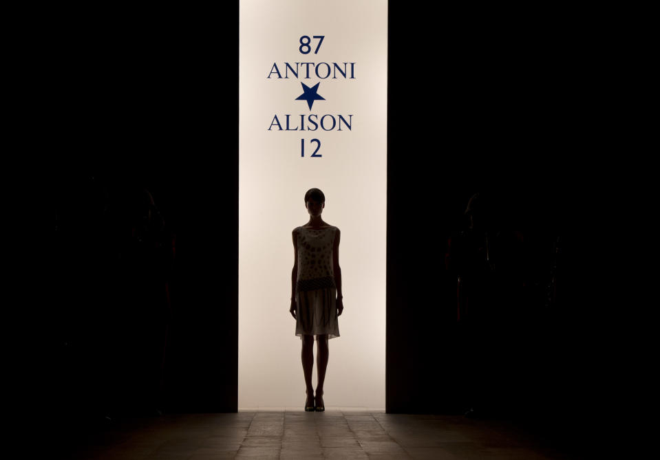 A model wears a design from the Antoni and Alison Spring/Summer 2013 collection during London Fashion Week, Friday, Sept. 14, 2012. (AP Photo/Joel Ryan)