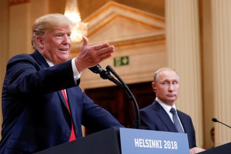 FILE PHOTO: U.S. President Donald Trump gestures during a joint news conference with Russia's President Vladimir Putin after their meeting in Helsinki, Finland, July 16, 2018. REUTERS/Kevin Lamarque/File Photo