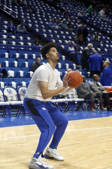 Johnny Juzang warms up before a game on March 3, 2020, at Lexington, Ky.