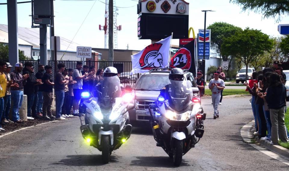 Gustine High School senior Brian Ortiz Nunez and his family received a motocycle officer escort from their home in Santa Nella, Calif. to Gustine High School for a special graduation ceremony on Friday, April 12, 2024. Shawn Jansen/Sjansen@Mercedsun-star.com