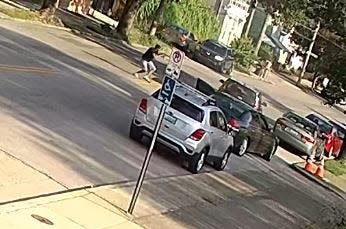 An image taken from surveillance footage of Dazzamon Jones, 32, firing shots into 34-year-old Edgar Lopez's vehicle in Covington on Aug. 8, 2023.