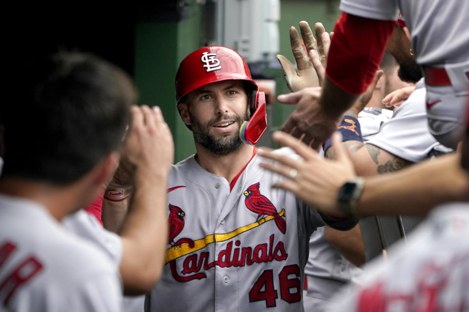 St. Louis Cardinals' Paul Goldschmidt celebrates in the dugout his homer off Chicago Cubs relief pitcher Sean Newcomb during the sixth inning of a baseball game against the Chicago Cubs Thursday, Aug. 25, 2022, in Chicago. (AP Photo/Charles Rex Arbogast)