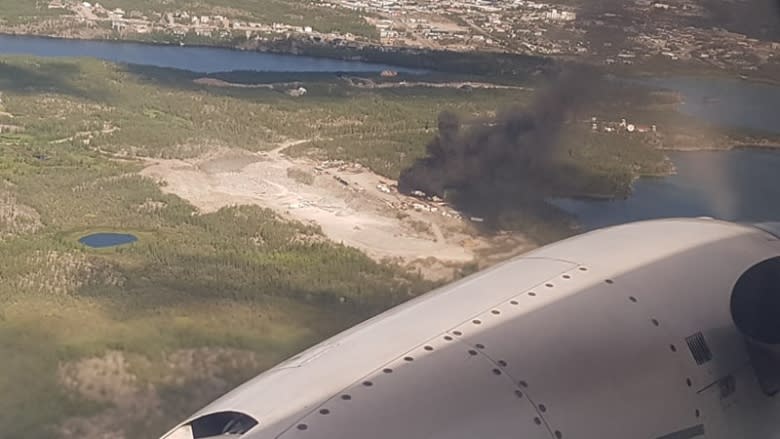 Fire in Yellowknife's Kam Lake on Thursday at Ace Enterprises' quarry