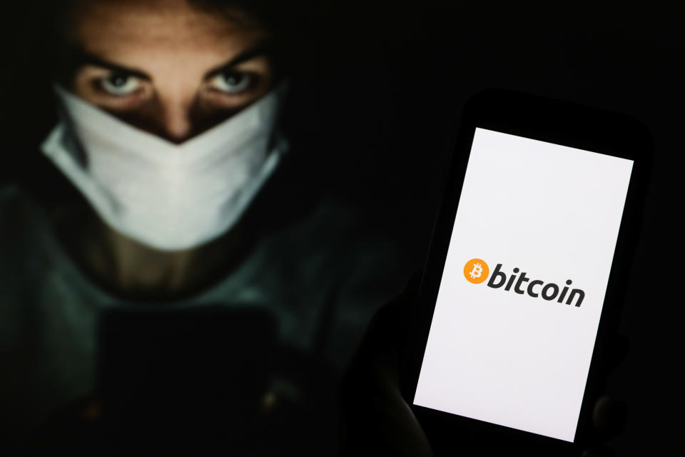 POLAND - 2020/05/04: In this photo illustration a Bitcoin cryptocurrency logo seen displayed on a smartphone. (Photo Illustration by Filip Radwanski/SOPA Images/LightRocket via Getty Images)