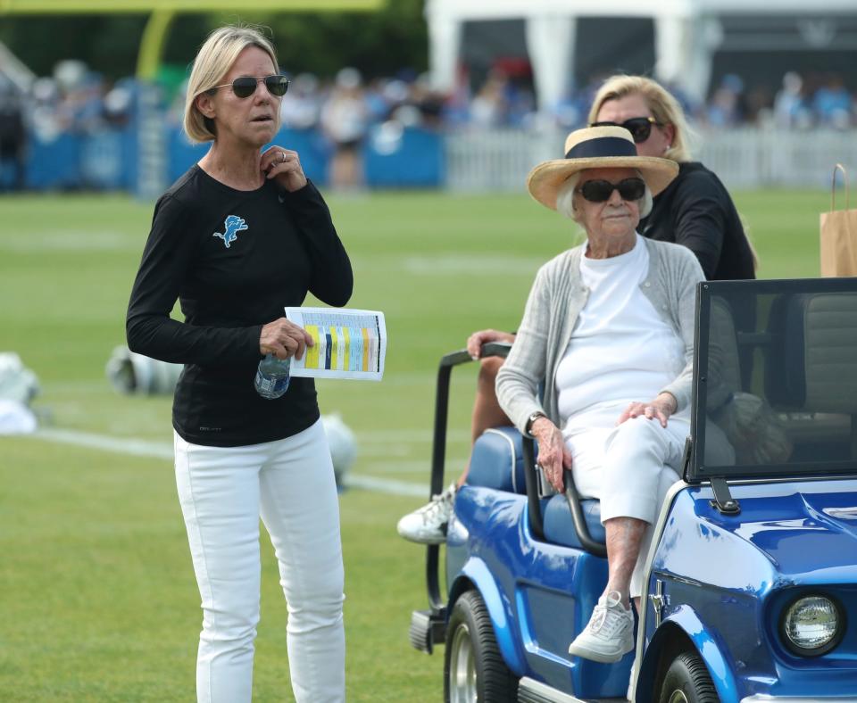 Lions owner and chairwoman Sheila Hamp, left, and owner emeritus Martha Firestone Ford on the field at the end of training camp on Wednesday, Aug. 02, 2023, in Allen Park.