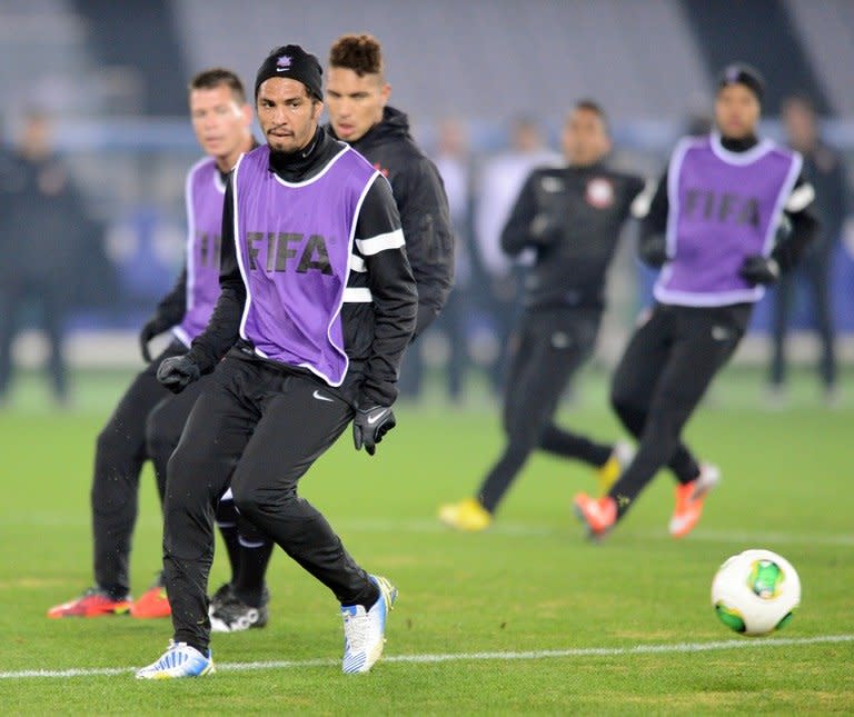 Corinthians defender Wallace (front) takes part in a team training session in Yokohama on December 15, 2012. Corinthians were the first undefeated winners of the Copa Libertadores since 1978