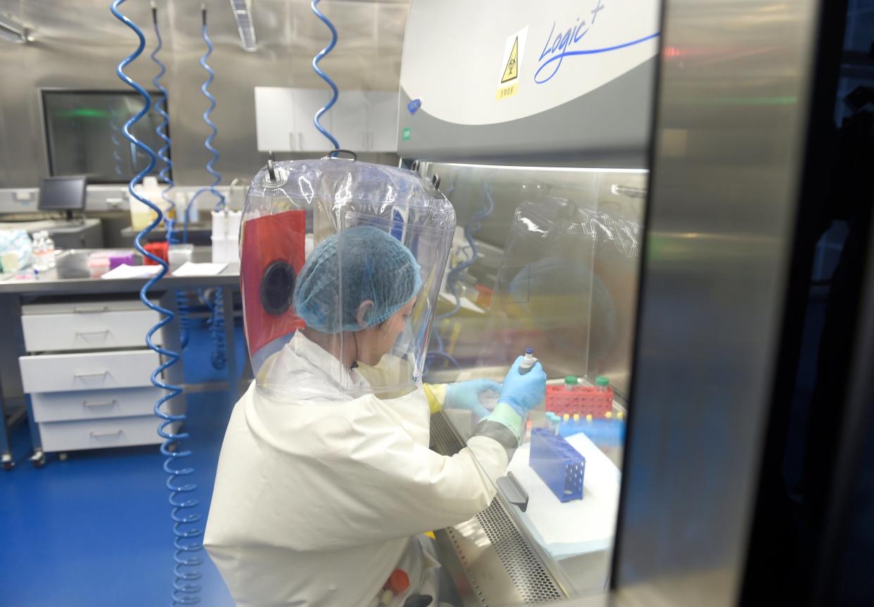 A researcher works in a lab of Wuhan Institute of Virology: EPA