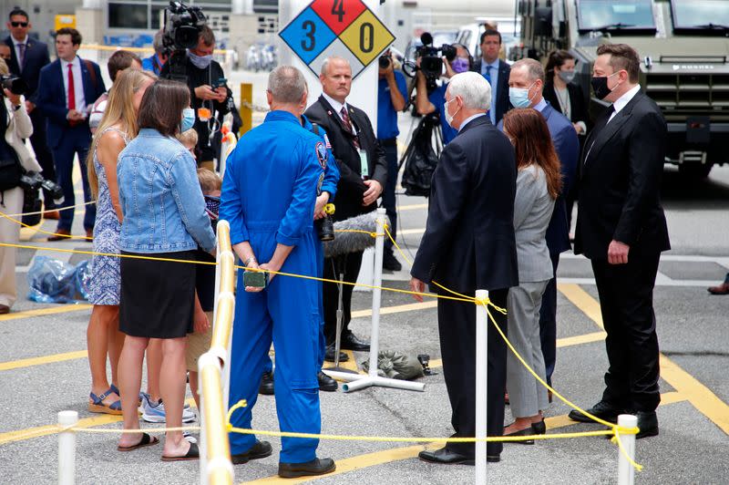 U.S. Vice President Mike Pence, SpaceX founder Elon Musk and NASA Administrator Jim Bridenstine speak before the launch of a SpaceX Falcon 9 rocket and Crew Dragon spacecraft at the Kennedy Space Center, in Cape Canaveral