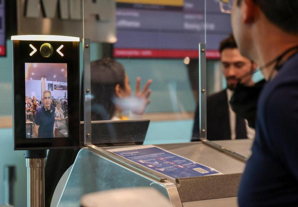 A passenger approaches the new facial-recognition camera to have his picture taken at Gate J17 at Miami International Airport on Wednesday Aug. 9, 2023, before boarding a Lufthansa flight to Germany. Carl Juste/cjuste@miamiherald.com