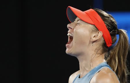 Tennis - Australian Open - Third Round - Melbourne Park, Melbourne, Australia, January 18, 2019. Russia's Maria Sharapova celebrates after winning the match against Denmark's Caroline Wozniacki. REUTERS/Aly Song